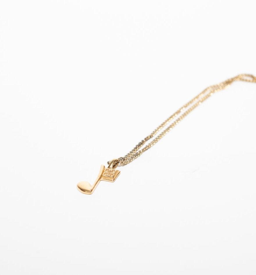 Golden Musical Note Necklaces - Volver